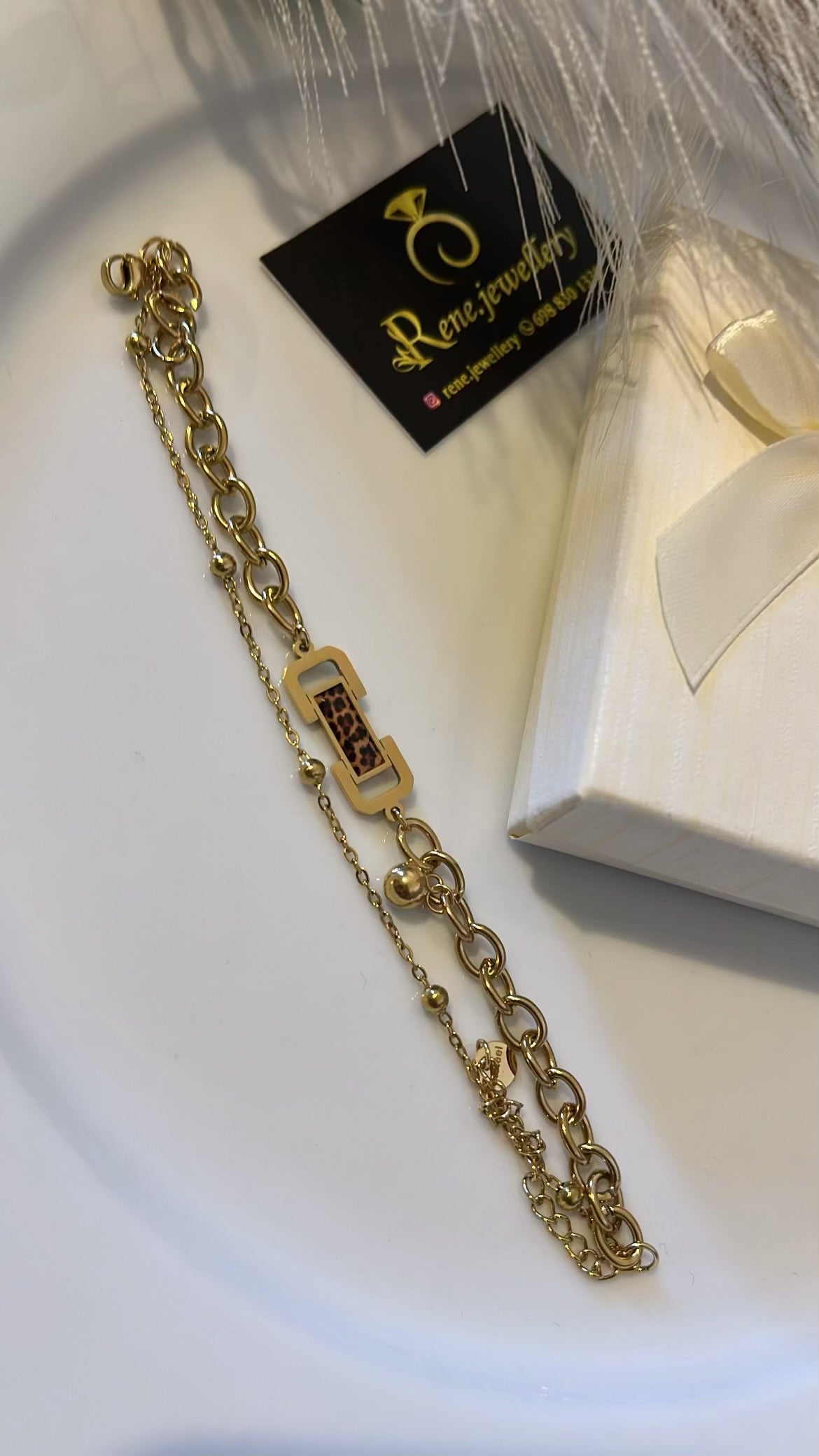 Αλυσίδα χεριού με στοιχείο animal print